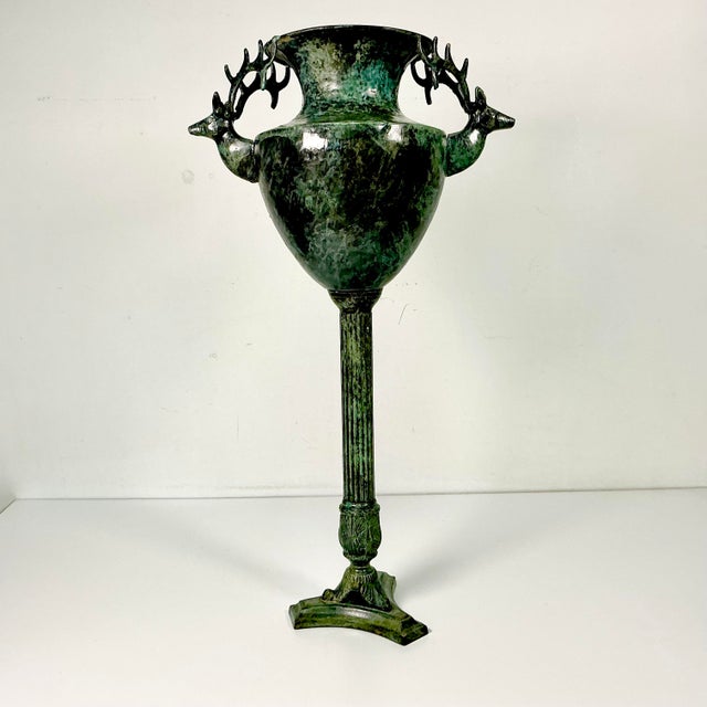 Vintage Home is pleased to offer this dramatic Tole metal pedestal Urn Vase. It stands over 21” tall and features two side...
