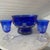 This striking three-piece dessert or serving set features a vibrant cobalt blue cut-to-clear crystal design. The...