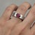 Not Yet Made - Made To Order Bezel Set Oval Garnet Wide Matte Band Silver, Gold, Size 10 For Sale - Image 5 of 6