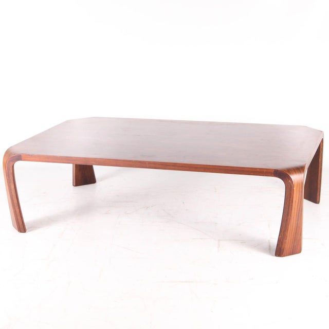Rare Japanese coffee table produced by Tendo Mokko. Two exotic woods were used to create this table, resulting in two...