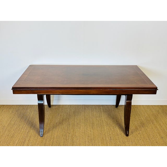 An elegant rectangular Art Deco table from the 1940s, featuring a superb wood veneer top with a geometric diamond pattern,...