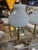 Graceful pair of Italian table lamps featuring hand-blown Murano opaline glass shades with softly rounded vase-form...