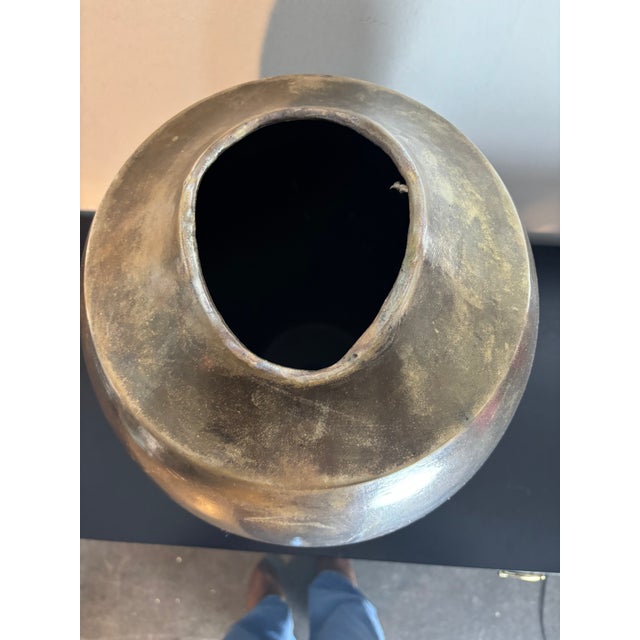 Sculptural Raku-fired studio vase by ceramic artist Tony Evans,known for his masterful use of metallic lusters and organic...