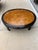 Stunning mid-century Ming-style coffee table featuring an ebonized black lacquer finish and a striking book-matched...