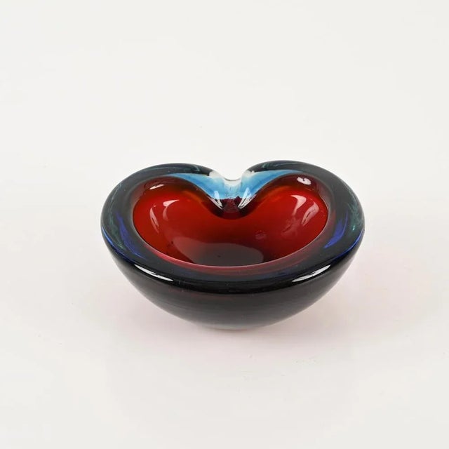 Magnificent heart-shaped, glass bowl or ashtray in a lovely Blu and Red crystal "sommerso" Murano artglass, that was...
