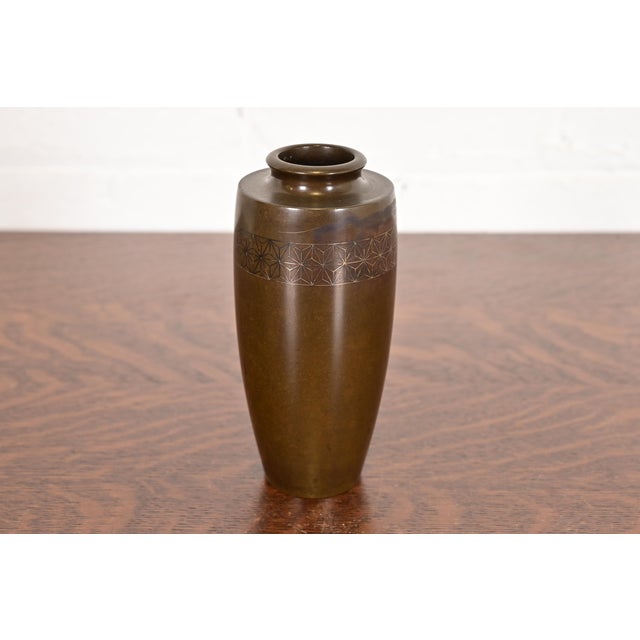 A beautiful Japanese Meiji period Arts & Crafts sterling silver on bronze vase In the manner of Heintz Art Metal Shop...
