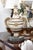 This is an elegant pair of Neoclassical urn-form architectural elements, sculpted to project gracefully from the wall...