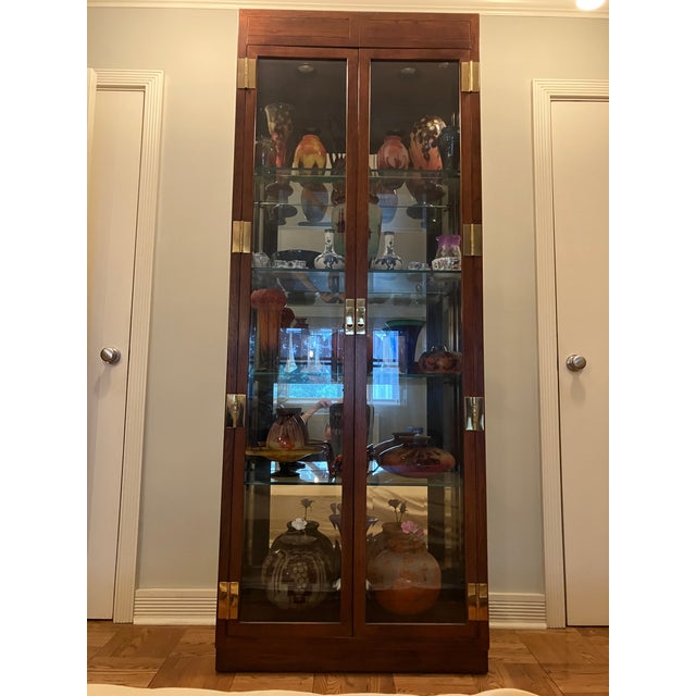 Henredon Scene 1 curio cabinet with 4 adjustable glass shelves. Some shelves have decorative etching. 3 sides of glass....