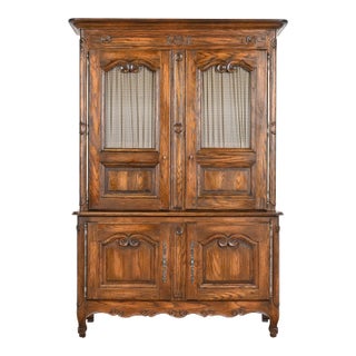 Baker Furniture French Provincial Louis XV Carved Oak Lighted Bar Cabinet, Circa 1960s For Sale