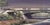Cherry Creek off Speer by Diego Glazer | Oil on Board Painting of a bridge over a creek For Sale