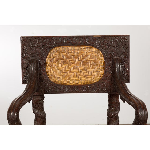 Anglo-Indian 1900 Armchair with Carved Back, Mythical Creatures and Woven Rattan For Sale In Atlanta - Image 6 of 12