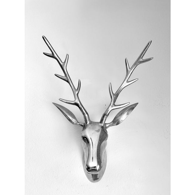 Large cast polished aluminum metal Deer Stag antler head wall sculpture.