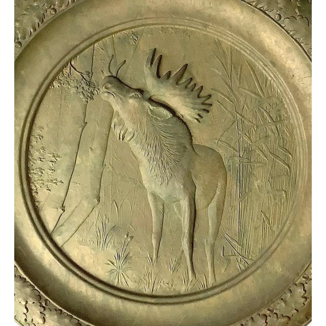 Circa 1950s metal wall plaque with embossed moose, trees and acorn and oak leaf edge. Nice old bronze coloration. Original...