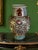 A remarkable Japanese Kutani porcelain phoenix vase dating to the late 19th-century Meiji period (1868–1912), richly hand-...