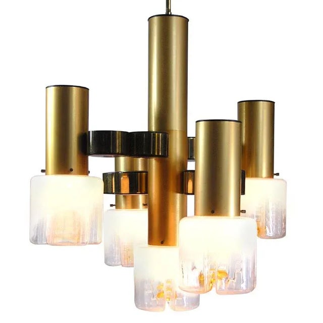 It is made of aluminum in gold and plastic elements. Glass shades with partly milk with texture decoration. External...