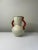 A rare ceramic vase designed by Anna-Lisa Thomson for Uppsala Ekeby, Sweden, circa 1940s. The vase features a graceful...