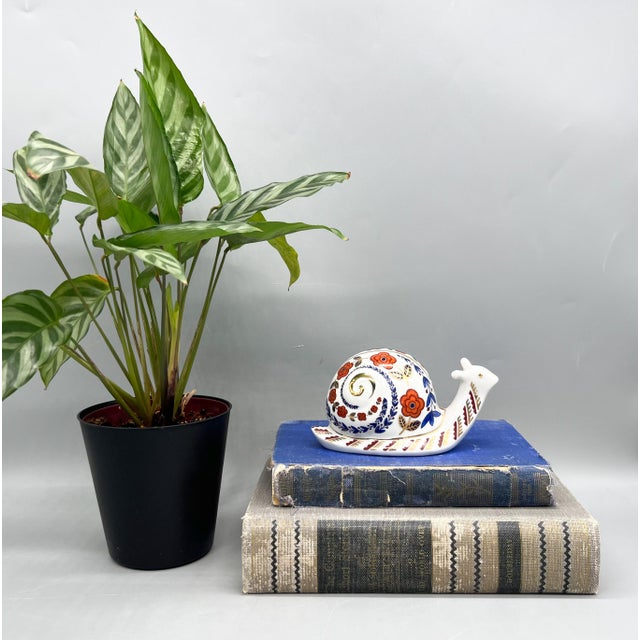 Charming 1980s Japanese porcelain snail figurine from the Tapestry Collection by Action Industries, Inc. The whimsical...