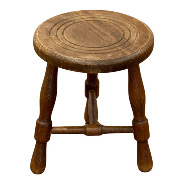 French rustic stool, circa 1880. French rustic stool, circa 1900, made of oak, with three turned legs with crossbars and a...