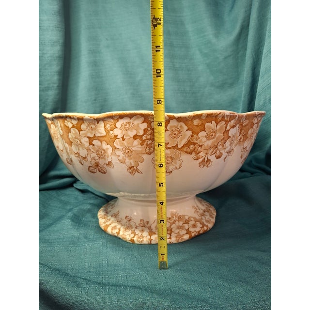 This is an exceptional and remarkably large late-Victorian pedestal punch bowl manufactured by Furnivals of Cobridge,...