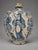 A substantial Sicilian pilgrim flask, attributed to Caltagirone and dated to the seventeenth century, fashioned in tin-...