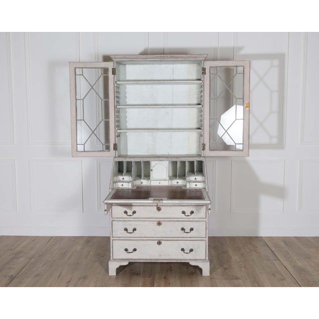An elegant late 18th-century European bureau bookcase, crafted circa 1790 and retaining its original understated...