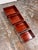 Design Plus Gallery presents a Set of Four Vintage Red Finish Wood Nesting Tray Boxes. This graduated set includes four...