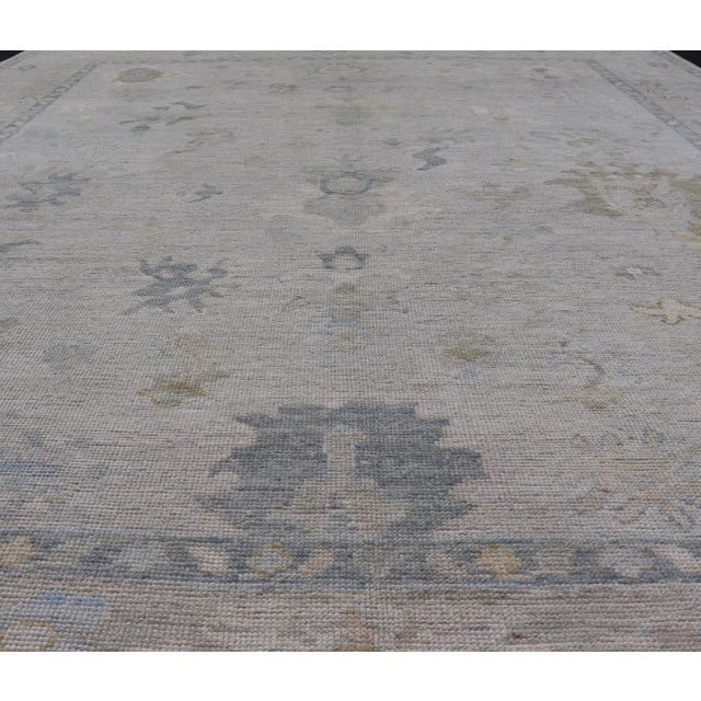 Traditional Modern Tribal Oushak With a Cream Border and Light Gray-Blue Background For Sale - Image 3 of 13