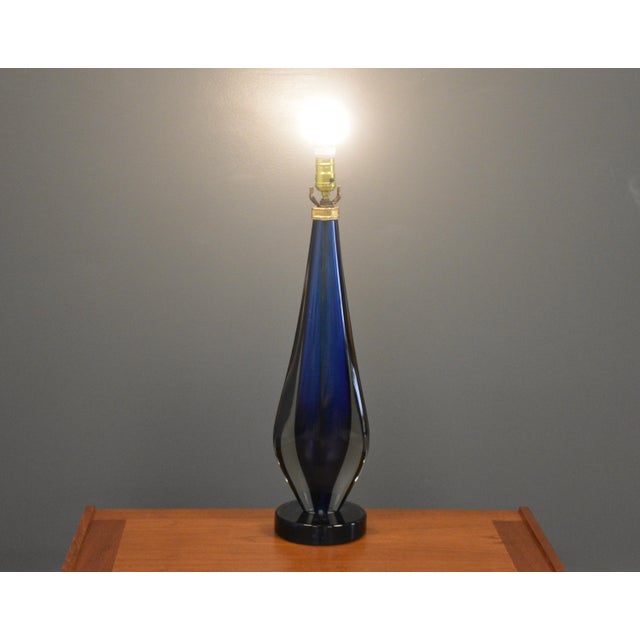 A mid century modern blue and purple Sommerso Murano glass table lamp by Flavio Poli. Made in Italy. Circa 1960’s....