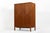This exceptional American mid-century modern mahogany gentleman’s chest or dresser cabinet was designed by Harvey Probber...