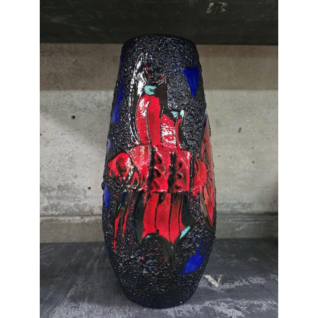 Spectacular mid-century vase made in West-Germany by the Scheurich company that's world famous for their Fat Lave style...