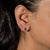 A matched pair of demantoid garnets blazes in vivid green in these solid 14K white gold stud earrings. Demantoid - here...