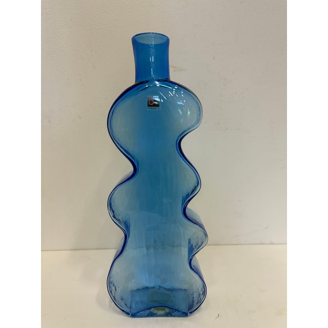our consideration: Art glass vase/bottle by Blenko known as the "puzzle wiggle" whimsical organic form some texture to the...