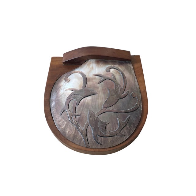 An extraordinary, large carved-wood box with a hinged lid, masterfully sculpted in richly grained Walnut. The lid is inset...