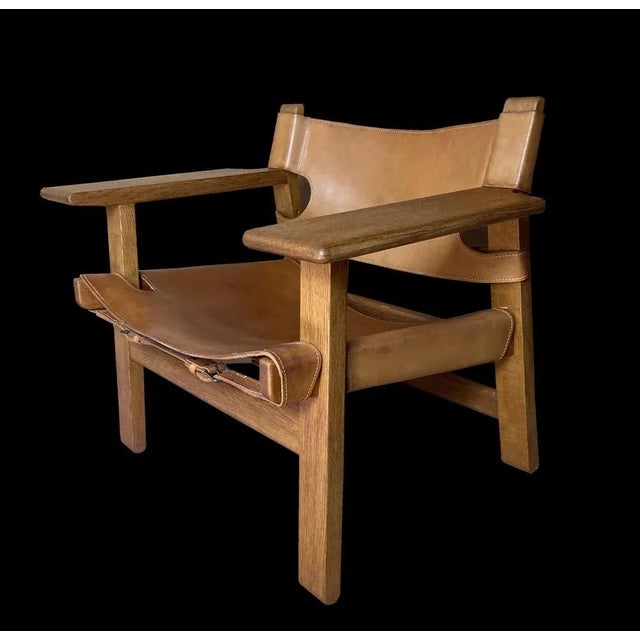 A Very nice clean example of the classic Spanish chair by Wegner, this is one of the earlier examples with the double rear...