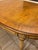 An exceptional, heirloom-grade mid-century luxury extension dining table crafted by the historic Karges Furniture Company....