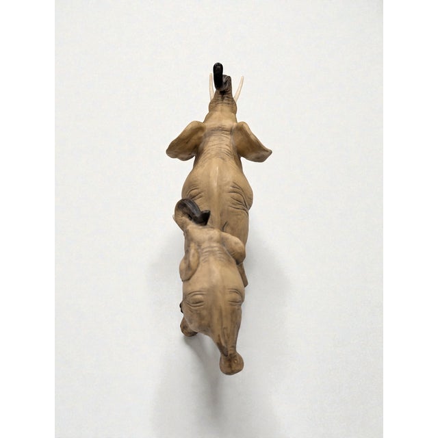Bring timeless Italian artistry into your home with this vintage ceramic figurine featuring a mother elephant and her...