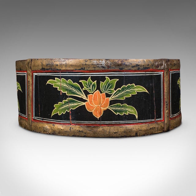 This is an antique cheese wheel carrier. An English, handpainted walnut dairy tray, dating to the Edwardian period, circa...