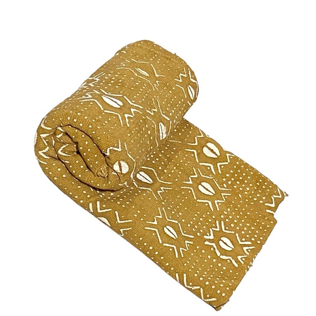 Superb mud-cloth cotton fabric, with a geometric design, handwoven, hand-sewn, and hand-dyed by the men and women of the...