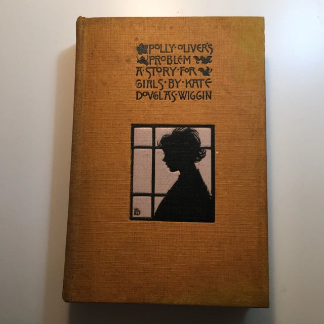 Antique book from 1921, "a story for girls." Hardcover with textured boards and charming embossed decorative design....