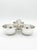 Begin your cocktail party with these silver-plated nut bowls that are connected for easy, elegant serving. Sleek lines,...