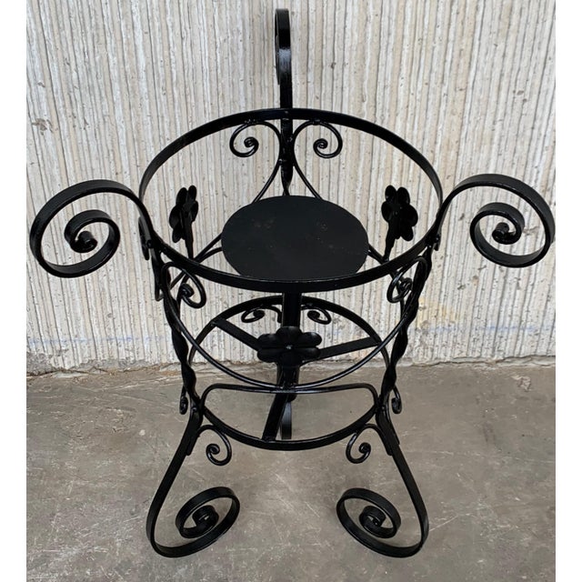 About Matched pair painted planters or plant stands made of wrought iron. Featuring 15" wide baskets that are height...