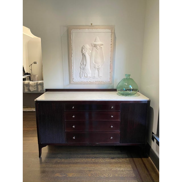 Dinner parties become easy and elegant when served from this Stone Top Buffet. The detail of the ribbed, rounded corners...