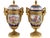 This elegant pair of circa 1880s French Sèvres-style porcelain urns combines deep cobalt-blue porcelain, romantic painted...