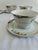 Set of 5 hand-painted porcelain cups and saucers by Meito China, made in Japan and marked “Warren” on the base. Each...