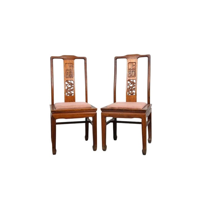 Chinese carved teakwood dining chair/s. The chairs are nicely carved with a dragon below the "Shanghai" kanji. The chair/s...