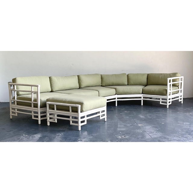 Inspired by the celebrated designs of Ficks Reed, this vintage modular sectional sofa showcases the timeless appeal of...