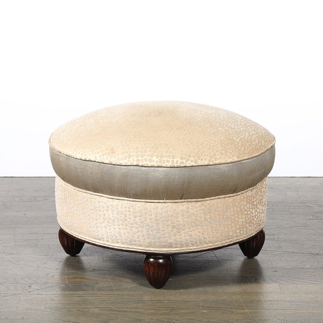 This exquisite pair of Art Deco upholstered ottomans, crafted in France circa 1925, showcases the sophisticated refinement...