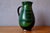 with its rustic yet refined charm, this bohemian glazed terracotta pitcher is quintessentially mid-century. Its slender,...