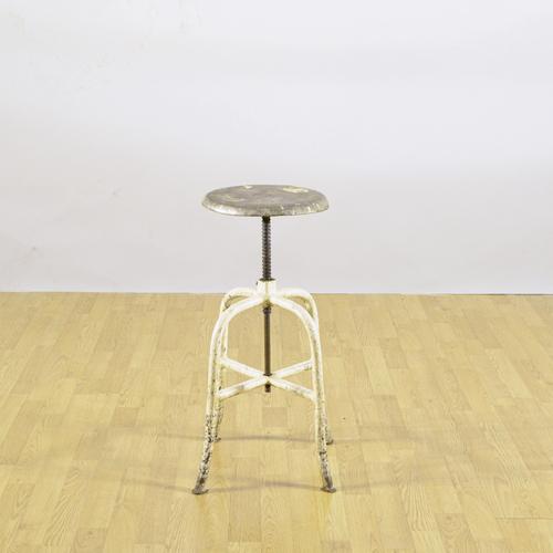 This vintage stool embodies the pure aesthetic of 1950s industrial design, a period in which the functionality of...