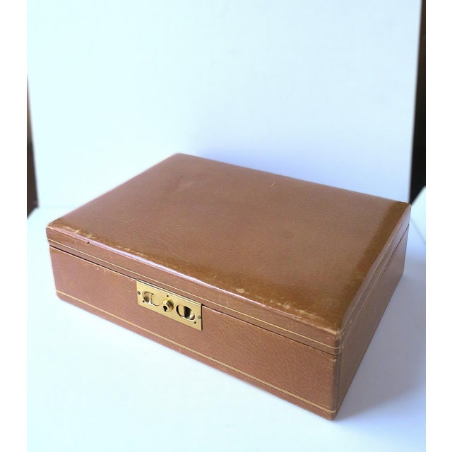 A relatively large European leather and suede jewelry box with removable tray, in the Modern style, circa late-20th...